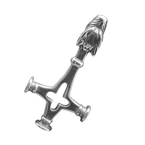May include: A silver pendant in the shape of a cross with a wolf's head at the top.