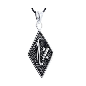 May include: A silver pendant necklace with a black diamond-shaped charm featuring the inscription "1%".