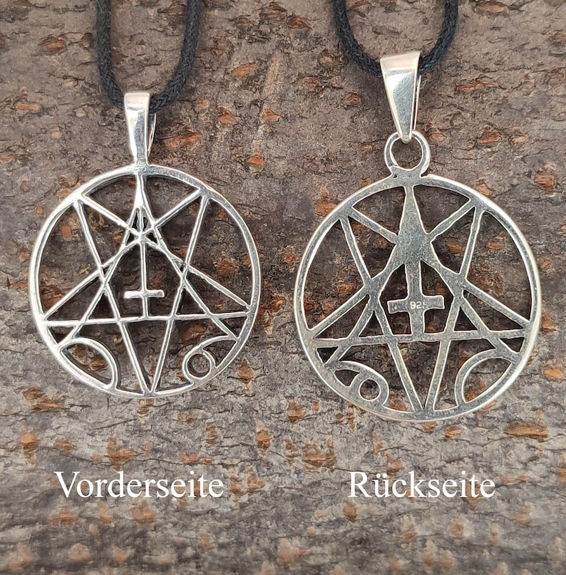May include: A silver pendant with a geometric design featuring a five-pointed star and a cross. The pendant is shown from both the front and back. The back of the pendant is stamped with "925", indicating it is made of sterling silver.