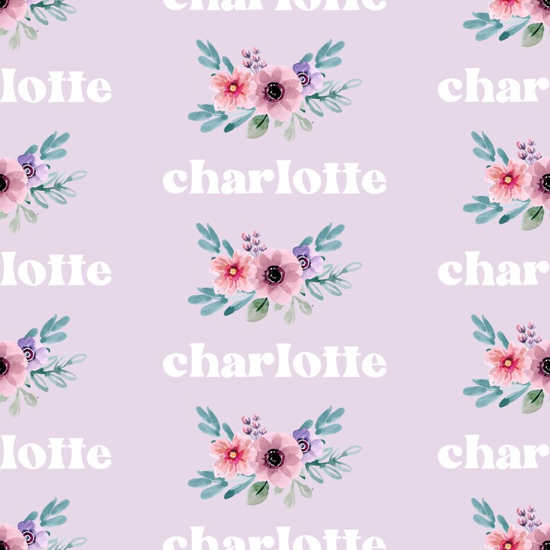 May include: A seamless pattern featuring the name "charlotte" in white text on a light purple background. The name is repeated throughout the pattern, with watercolor floral bouquets in shades of pink, purple, and green interspersed between each name.
