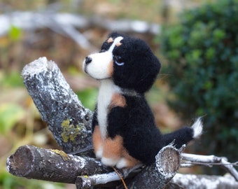 Felted figurine of a Bernese Mountain Dog.