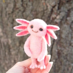 Felted toy Axolotl. The toy is made using the dry felting technique. Eco-friendly toy.