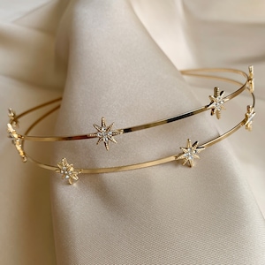 Cerchietto con cristalli e strass a forma di stella dorata per look da sposa o da compleanno