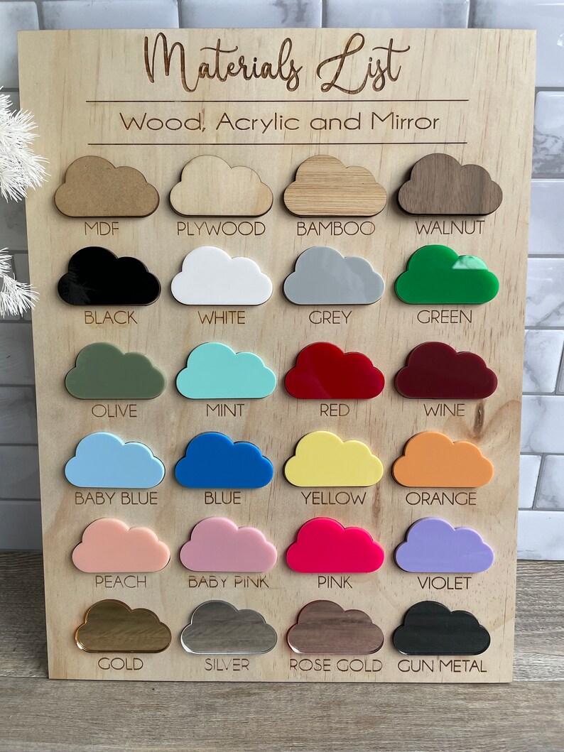 May include: A chart with the title "Materials List: Wood, Acrylic and Mirror" showing different colors of wood, acrylic and mirror in cloud shapes. The colors include: MDF, Plywood, Bamboo, Walnut, Black, White, Grey, Green, Olive, Mint, Red, Wine, Baby Blue, Blue, Yellow, Orange, Peach, Baby Pink, Pink, Violet, Gold, Silver, Rose Gold, Gun Metal.