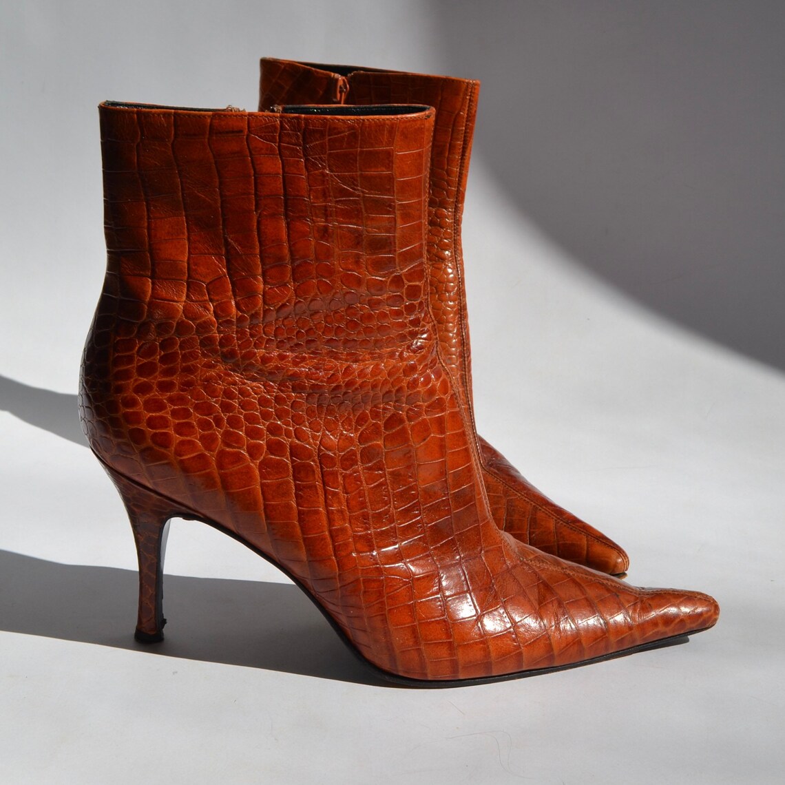 red leather pointed toe booties