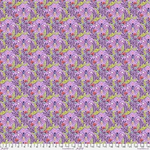 May include: A repeating pattern of stylized butterflies, flowers, and foliage in shades of purple, green, and red. The design is set against a light purple background, creating a vibrant and detailed textile pattern. The fabric has a ruler along the bottom edge.