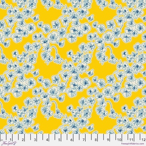 May include: A vibrant yellow fabric with a repeating pattern of blue and white floral branches. The flowers have a delicate, outlined design, creating a contrast against the bright background. The fabric is marked with inch measurements along the bottom.