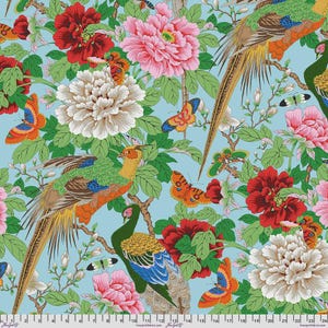 May include: A light blue fabric featuring a repeating pattern of colourful pheasants, large red, pink, and white peony flowers, green leaves, and orange and blue butterflies. A white measuring tape is visible along the bottom edge of the image.