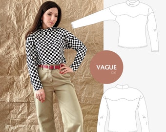 May include: A black and white checkered long-sleeved shirt with a high neck. The shirt is being worn by a person with brown hair and a red belt. The image also includes a line drawing of the shirt with the text "VAGUE 016".