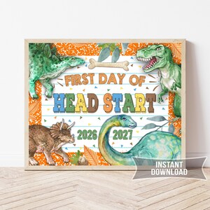 May include: A rectangular sign featuring watercolor dinosaurs, including a green Stegosaurus, a green T-Rex, a brown Triceratops, and a long-necked dinosaur. The text reads FIRST DAY OF HEAD START 2026 2027, with an orange border and a bone illustration.