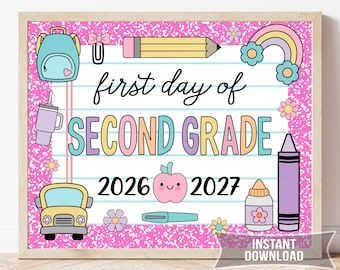 May include: A framed sign with a pink background and school-themed illustrations. The sign reads "first day of SECOND GRADE" with the years 2026 and 2027. Includes a backpack, pencil, rainbow, and other school-related graphics.