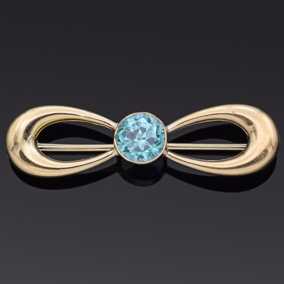 Vintage 14K Yellow Gold Blue Zircon Infinity Broo… - image 1