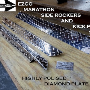 May include: A set of four silver diamond plate side rocker and kick plate panels for an EZGO Marathon golf cart. The panels are highly polished and have a diamond pattern.