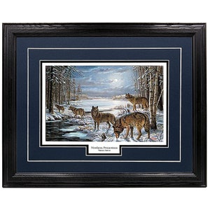 May include: Framed print of a winter scene with a pack of wolves in a snowy forest. The wolves are brown and gray, and the forest is covered in snow. The moon is visible in the sky, and the scene is lit by moonlight. The print is titled "Northern Premonitions" and is by Various Artists.