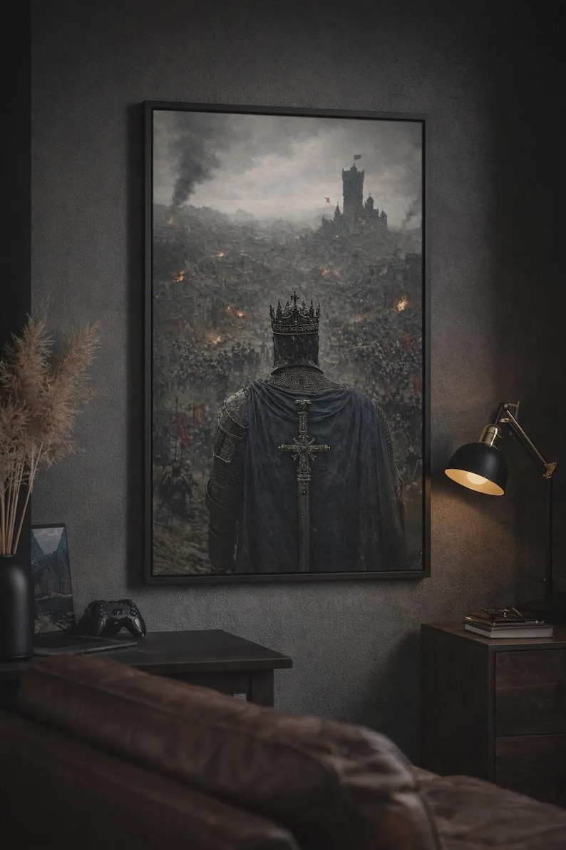 May include: A framed canvas print depicting a medieval knight in armor, wearing a crown and a dark blue cape. The knight stands before a battlefield with a castle in the distance, smoke and fire visible. The artwork has a dark, dramatic aesthetic.