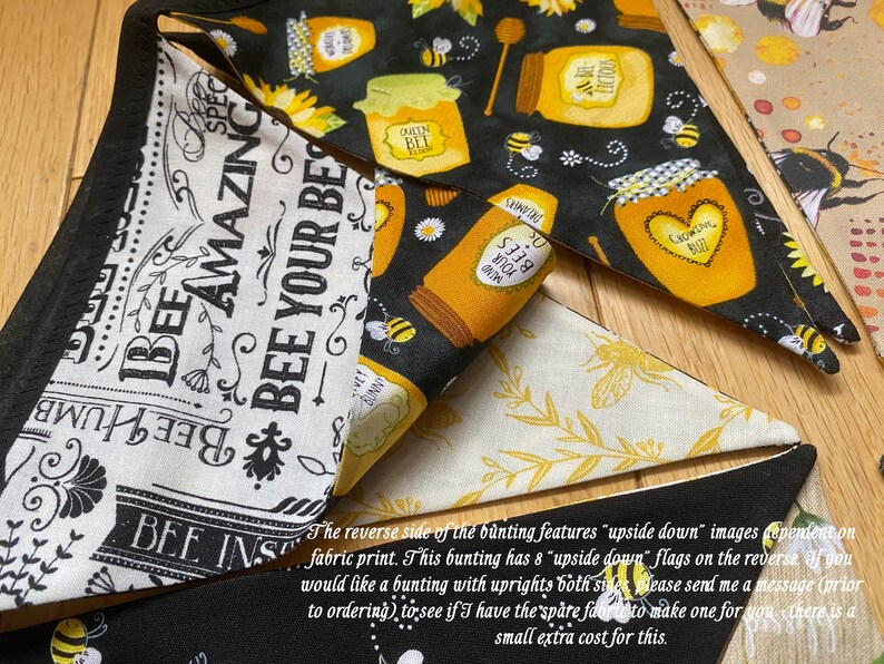 Bee Lovers Honey Hive Inspirational Quote Bee Kind Sunflower Black and Yellow Cotton Fabric Bunting by Bluebell Bunting. Reverse of the bunting features upside down images dependent on fabric print. 8 of the 10 flags are upside down on the reverse.