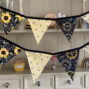 Bee Lovers Honey Hive Inspirational Quote Bee Kind Sunflower Black and Yellow Cotton Fabric Bunting by Bluebell Bunting. Medium and small bunting on a kitchen dresser.