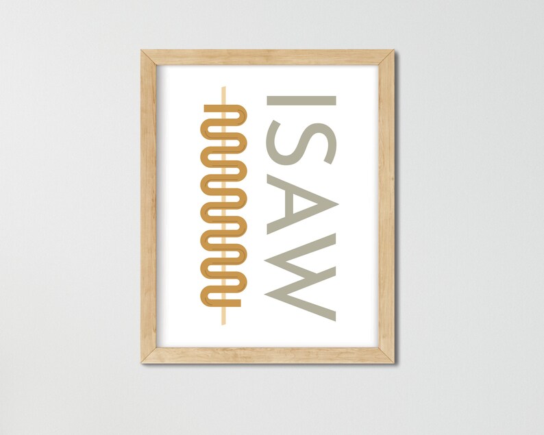 May include: A framed print with the text "I SAW" in gray and a stylized, abstract design in gold.