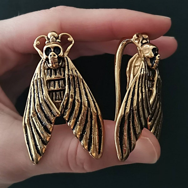 Goldcolored Moth Hangers ab 25 Euro