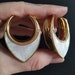 Goldcolored Shell Saddle Hangers ab 17,50 Euro 