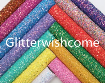 May include: A collection of colorful glitter sheets in various shades, including red, green, blue, purple, and gold. The text "Glitterwishcome" is displayed in white across the image. These sheets are ideal for crafting and decorative projects.