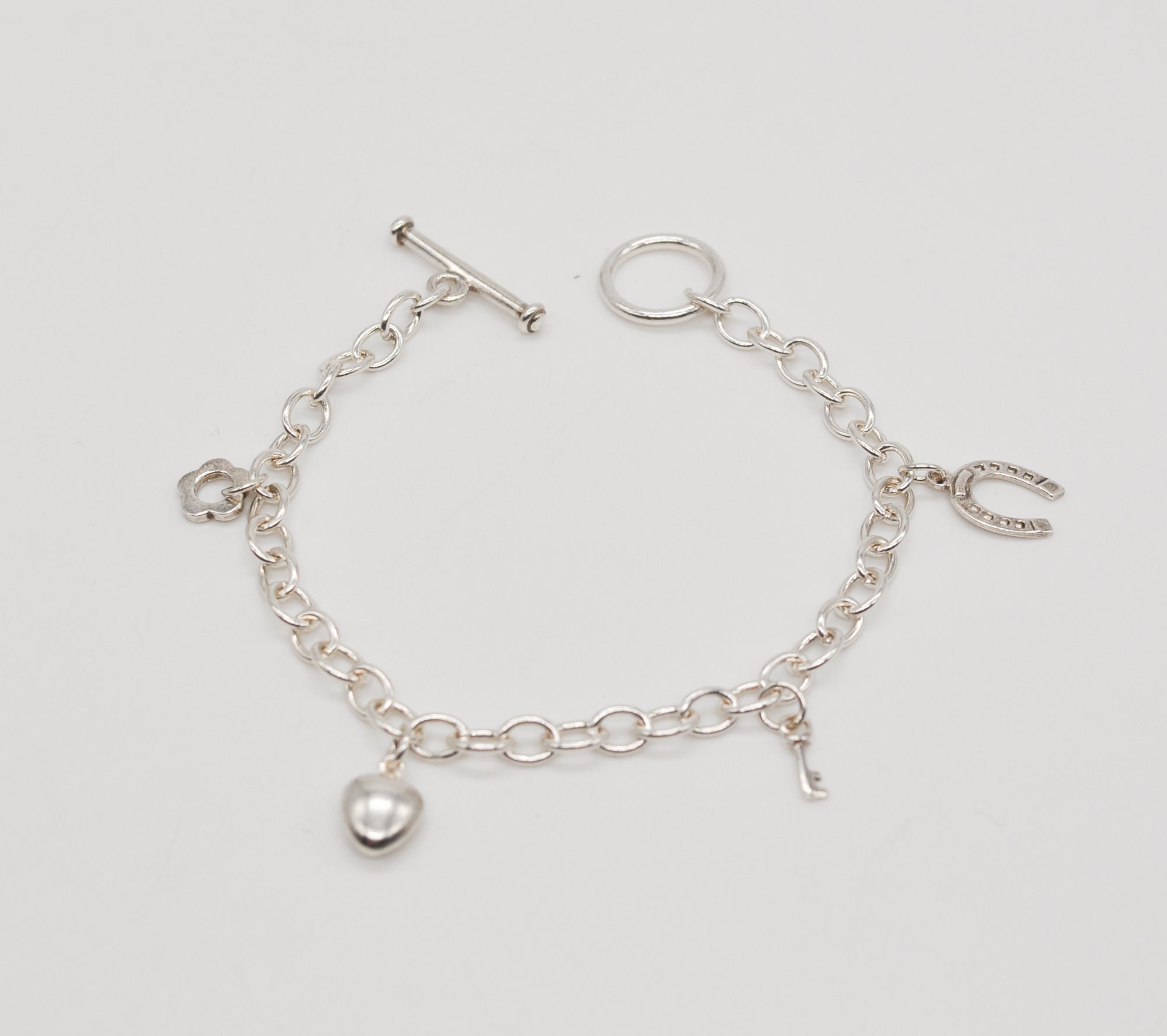 Vintage 925 Sterling Silver Anchor Bracelet with Charms. Length: 18.5 cm / 7.2 inch.