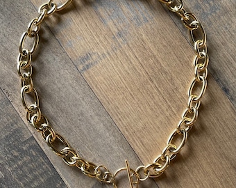 Stainless steel chain bold chunky links with murano glass heart charm.