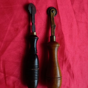 Victorian leather stich tracers one maker E .PRESTON the other no name but adorned with a brass furrel both rare and quitly pieces