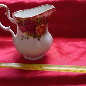 Vintage royal Albert Old Roses cream jug. Vintage royal Albert 1960s milk jug perfect condition needs a good owner Somerton wash it nice