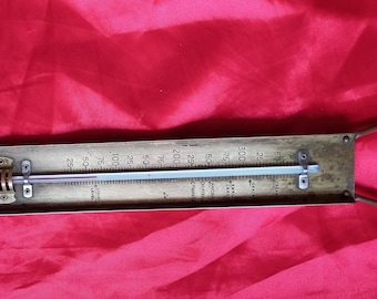 Vintage brass thermometer with copper hanging hoop very good condition nice patina perfect for any kitchen classic or modern would Grace any