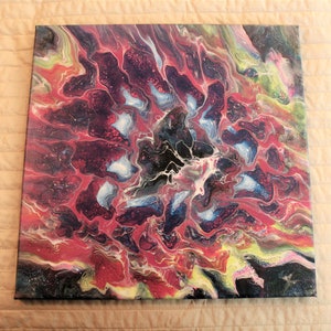 May include: Abstract painting on canvas with swirling patterns in shades of red, black, white, blue, and yellow.
