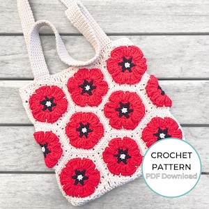 May include: Crochet pattern for a tote bag with a poppy flower design. The bag is made with beige yarn and features red poppy flowers with black centers. The text "CROCHET PATTERN PDF Download" is visible in the image.