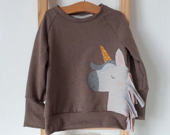 Unicorn sweater for children with unicorn appliqué and jersey mane