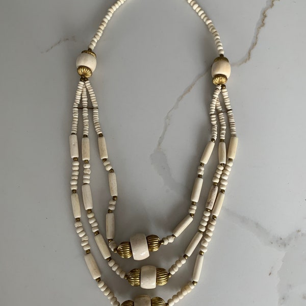 Vintage three strand cream bone necklace with gold fixings