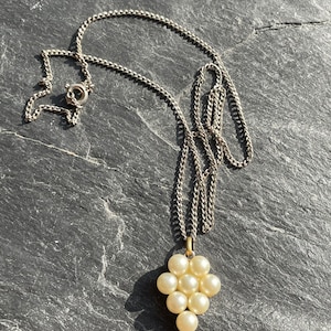 Vintage pearl pendant on a silver chain