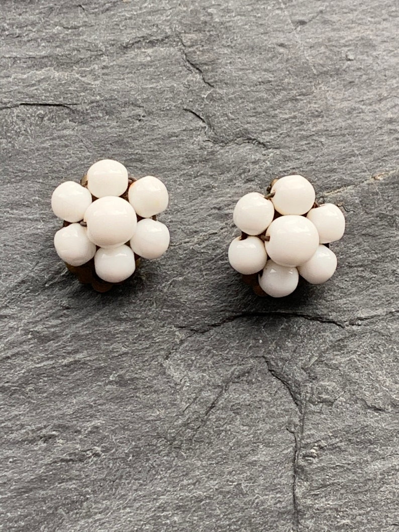 White milk glass clip on vintage earrings