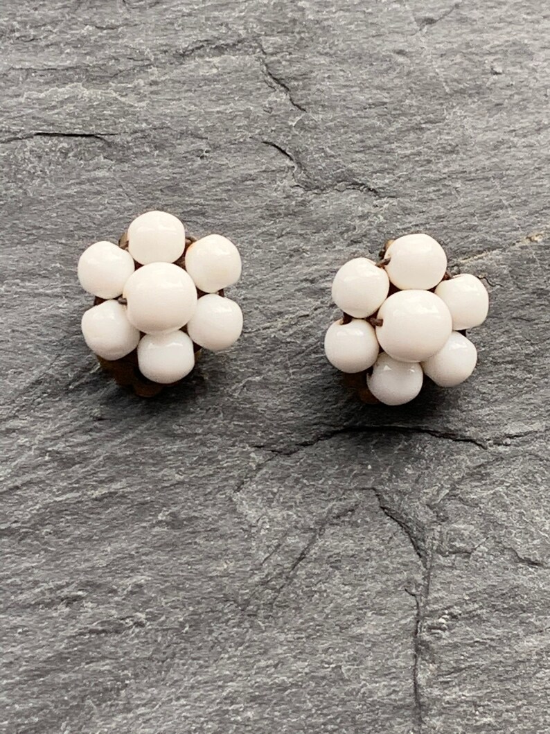 White milk glass clip on vintage earrings