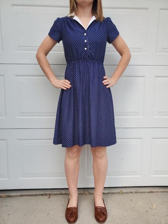 Blue and white polka dot dress.