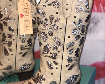 Glittrande vita cowboystövlar