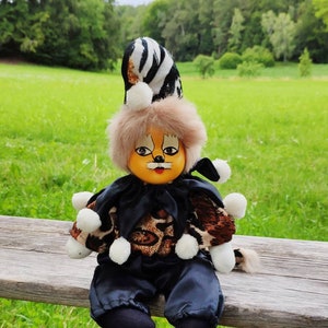 Vintage animal doll or clown with hand painted face, Halloween decoration