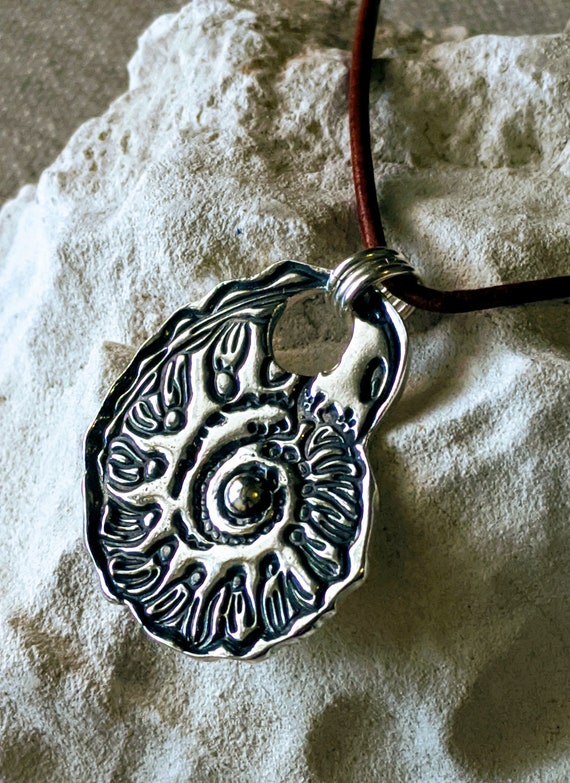 Nautilus silver and cord necklace（Nautilus Fine Silver