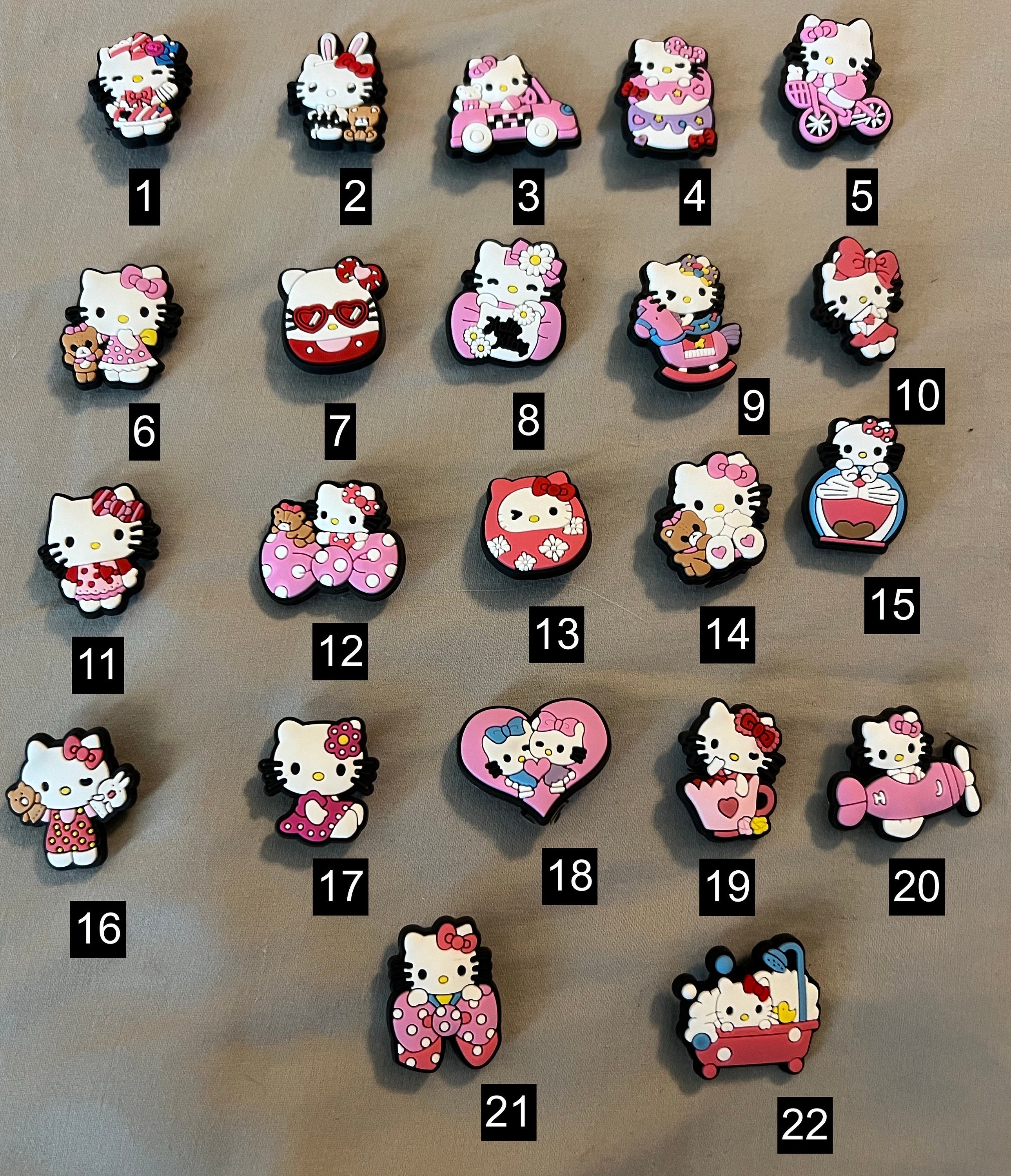 5 - 30 Assorted Hello Kitty Themed Enamel Charms. Various Designs