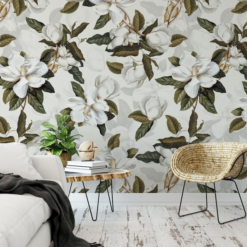 bathroom with a bathtub and Southern Magnolia Flower, Floral Wall Peel and Stick Wallpaper and a white couch and rattan chair with metal legs