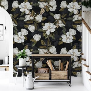 entry way with white magnolia flowers on a black background wall covering