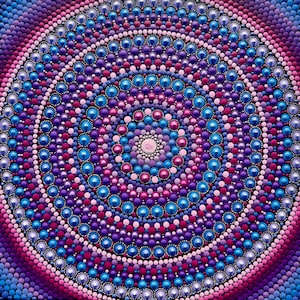 May include: A detailed, symmetrical mandala design composed of concentric circles of colorful dots. The artwork features a palette of blues, purples, pinks, and white, creating a visually captivating pattern. The dots vary in size, adding depth and texture to the overall composition.