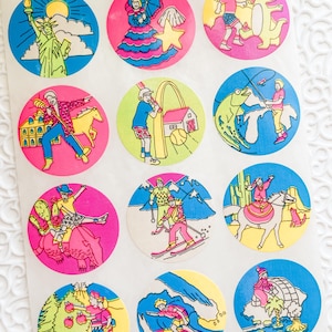 May include: A sheet of colourful round stickers featuring various scenes from around the world. The stickers depict people in different activities, such as riding horses, skiing, surfing, and fishing. The stickers are perfect for adding a touch of fun and whimsy to any project.
