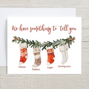 Nous avons quelque chose à vous dire, faire-part de grossesse pour Noël, bas de Noël, nom de famille personnalisé, date prévue pour l'accouchement, personnalisé