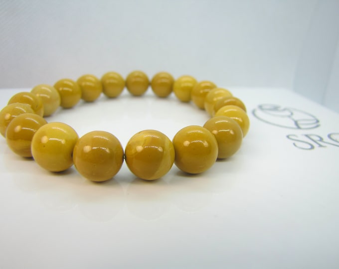 Natural Yellow Mookaite  bracelet 10 mm beads.