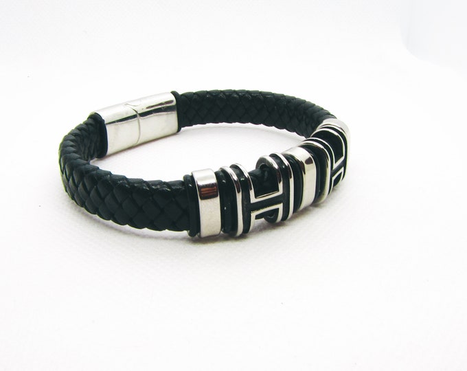 Genuine leather bracelet with stainless steel magnetic clasps.