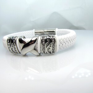 Genuine leather bracelet with stainless steel magnetic clasps , X slide and Rhinestone two slides